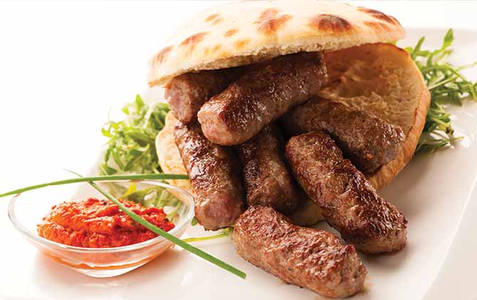 Photo of Cevapi, cevapcici, traditional Balkan food delicious minced meat food to eat in eastern europe cevapi in sarajevo bosnia and herzegovina