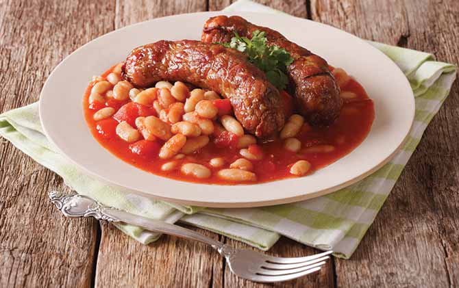 Tavche grache, Pork sausages with beans and cooked tomatoes traditional dish of Macedonia best food in eastern europe is the tavche grache in skopje macedonia