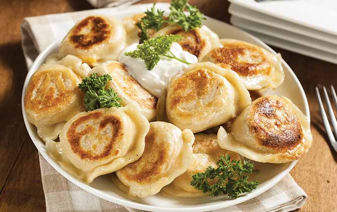 Cabbage rolls and stuffed peppers, Poland best food in eastern europe is cabbage rolls and stuffed peppers on a plate in warsaw poland