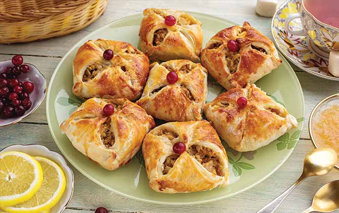 Russian open pirozhki (baked patties) with filling during tea party best food to try in eastern europepirozhki in moscow russia