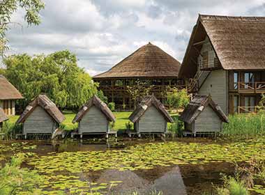 best places to visit in eastern europe is danube delta in romania huts along the river