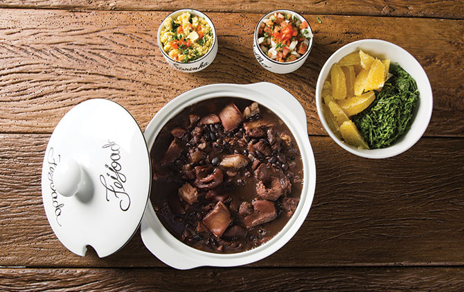 Feijoada, Brazilian cuisine, is a stew of beans with beef and pork