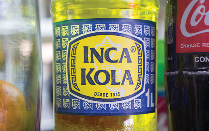  Bottles of yellow Inca Kola, Golden Cola, a Peruvian soft drink created in 1935