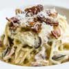 tourist's travel food, creamy italian pasta carbonara