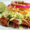 mexican food is popular everywhere in the world and enchiladas should be something everyone has experienced