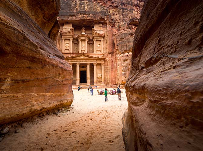 A group tour visiting petra one of the new 7 wonders of the world