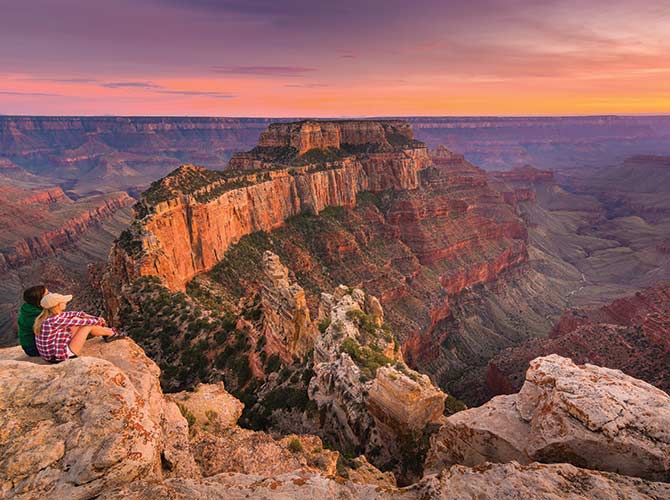 The Grand Canyon, USA A couple overlooking the grand canyon in America