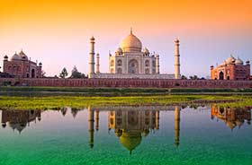 Taj Mahal reflected in the river below on a group tour to india and nepal asia