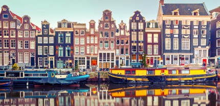 Amsterdam-canal-with-typical-dutch-houses.-Holland. Amsterdam-canal-with-typical-dutch-houses-Holland