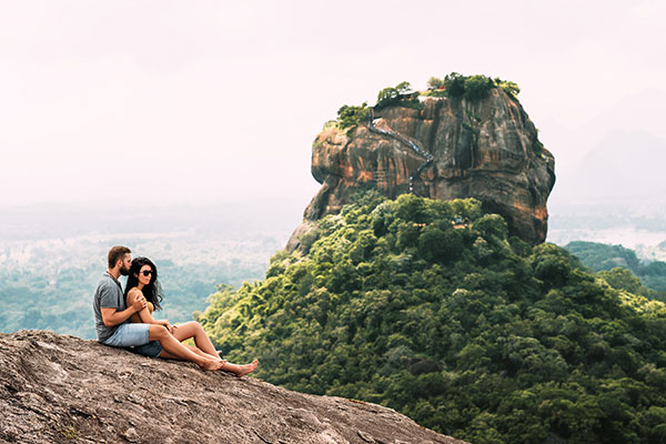 Couple admiring view of Sigiriya Rock in Sri Lanka sri lanka, sri lanka tours, sri lanka holidays, sri lanka travel,