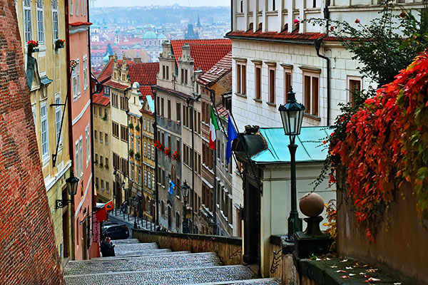 View of an alley in Prague with stunning architecture Eastern Europe group travel, private tours to eastern europe, prague