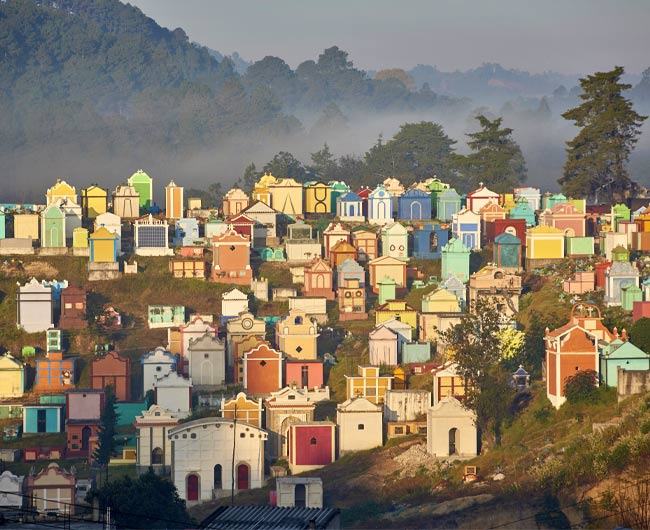 Vibrant graves of Chichicastenango Cemetery Experience a different outlook on death in the Chichicastenango Cemetery