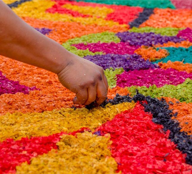Laying colourful petals down for Easter celebrations in Antigua