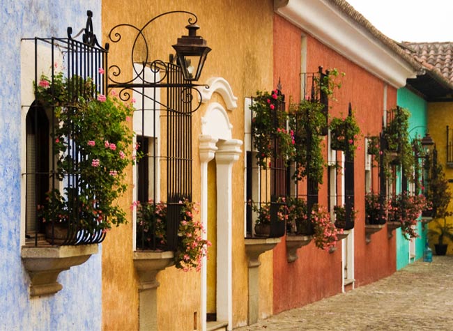 Colourful streets of Antigua Walking is the best way to get around Antigua