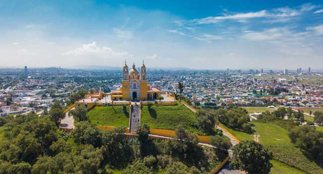 Aerial view over Cholula Hill, Puebla Puebla is a location which our group tours will stop at and allow you to induldge in local culture and historic landmarks