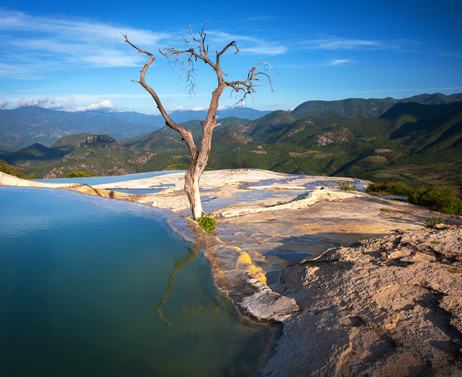 The views from Hierve el Agua Enjoy a truly unique soak in the springs at the top of a petrified waterfall