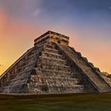 Central America travel region represented by the historical ancient ruin of Chichenitza near Cancun, Mexico.