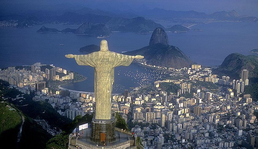 Christ the Redeemer looking out over Guanabara Bay in Rio de Janeiro, Brazil Christ the Redeemer looking out over Guanabara Bay in Rio de Janeiro, Brazil
