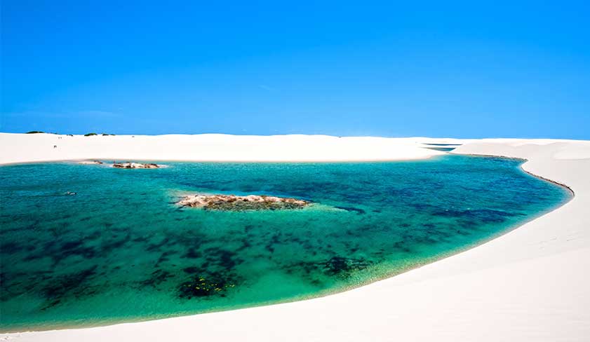 A blue lagoon in Lencois Maranhenses National Park A blue lagoon in Lencois Maranhenses National Park