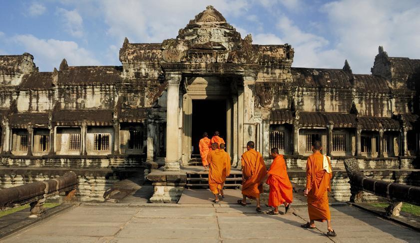 Monks entering Angkor Wat, Cambodia Monks entering Angkor Wat, Cambodia