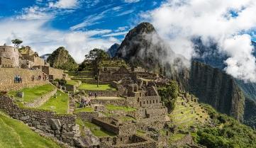 The sun shining on Machu Picchu, Peru