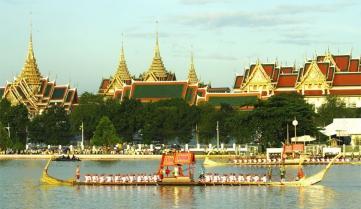 A guard ship passing the Kings Palace in Bangkok, Thailand
