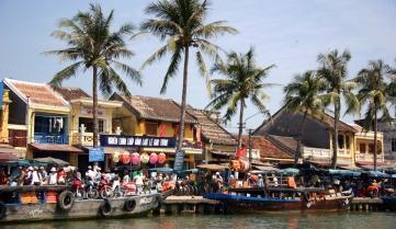 Bustling life along the Hoi An waterfront, Vietnam