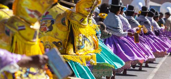 experience one of the top festivals in south america on a group holiday tour during the de la candelaria in peru or bolivia