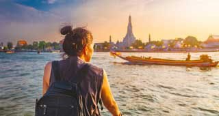 solo female traveller in bangkok, Thailand explores the famous asian city, a perfect holiday trip for backpacker