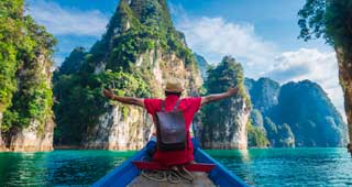 male solo traveler explores the island around phuket, thailand on a paradise like adventure holiday tour